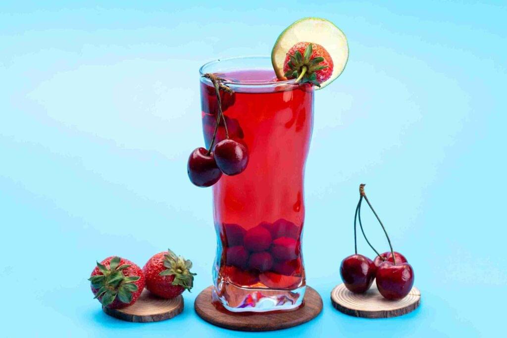 one glass of Sprite Cranberry Pineapple juice cherry with it